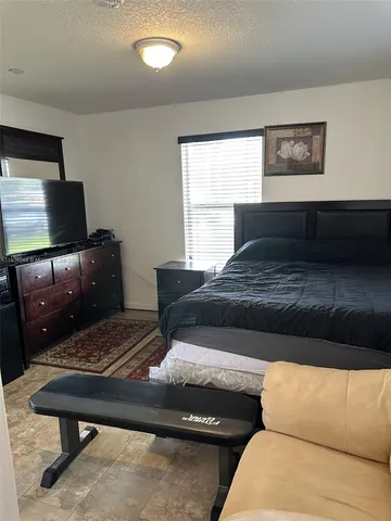 a living room with a couch and a coffee table