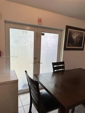 a view of a workspace with furniture