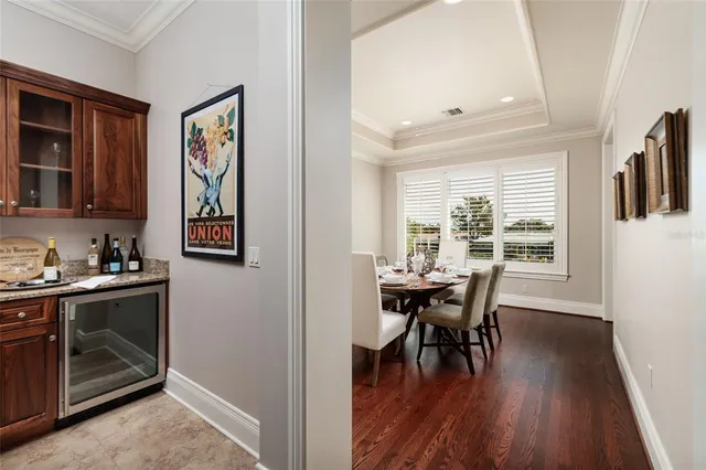 a bedroom with a bed and a table in it