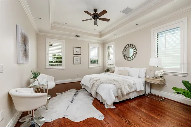 a bath tub sitting in a bathroom next to a window