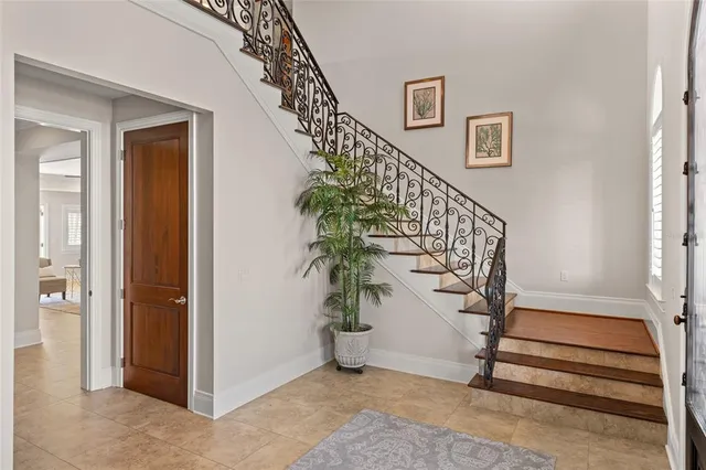 a kitchen with a sink a stove and cabinets