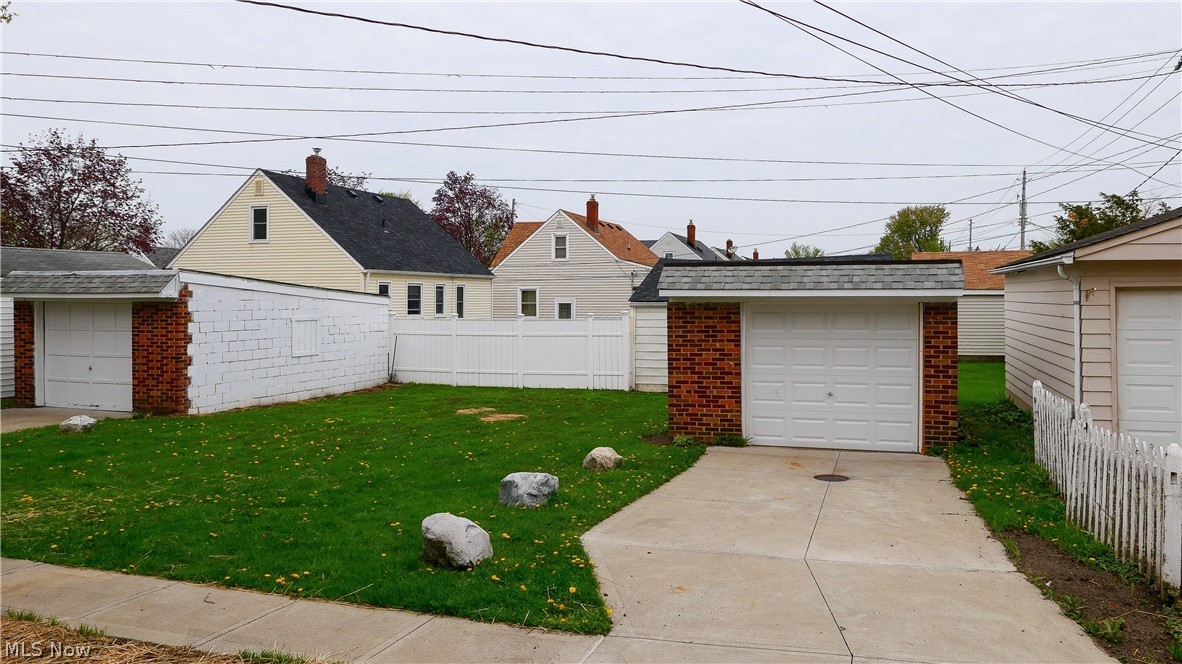8604-8606 Biddulph Road Brooklyn, OH 44144 - Photo 26 of 29 Back yard showing both garages.
