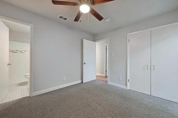 a view of kitchen with stainless steel appliances kitchen island microwave and stove