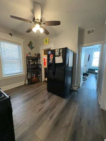 a view of livingroom with furniture and wooden floor