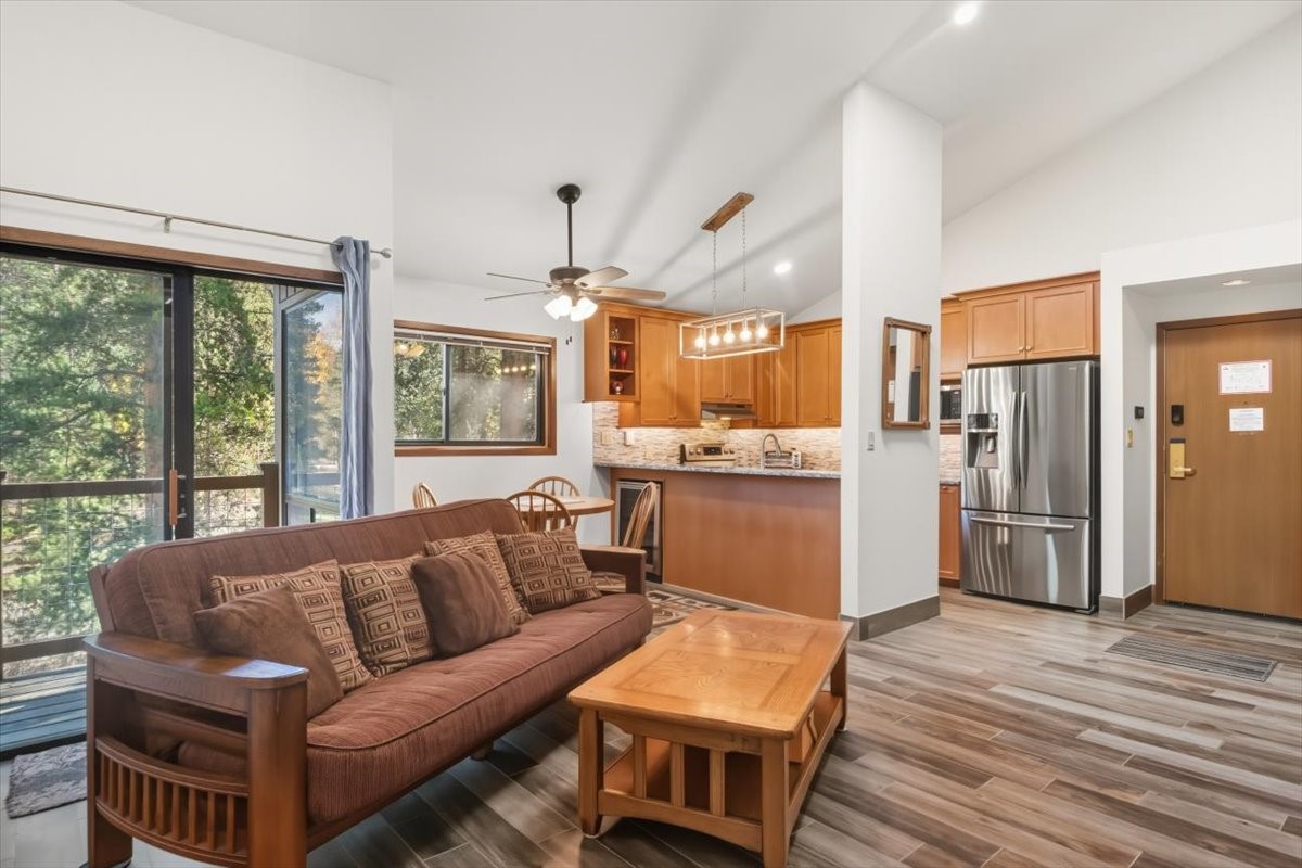 1937 Soda Ridge Road, Unit 1159 Keystone, CO 80435 - Photo 6 of 29 Living room featuring light wood finished floors, ceiling fan, high vaulted ceiling, and recessed lighting