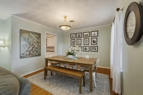 a view of a livingroom with furniture and window