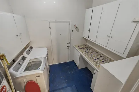 a view of utility room with washer and dryer