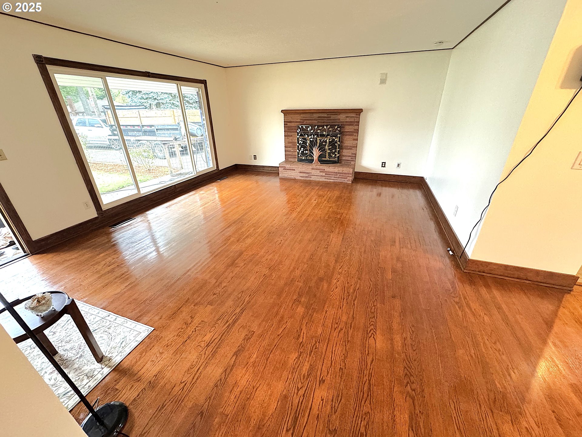 2442 Southeast 190th Avenue Portland, OR 97233 - Photo 12 of 36 a view of an empty room and wooden floor
