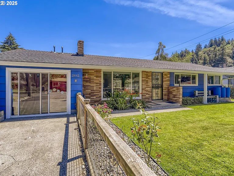 2442 Southeast 190th Avenue Portland, OR 97233 - Photo 2 of 36 a view of a house with backyard porch and sitting area