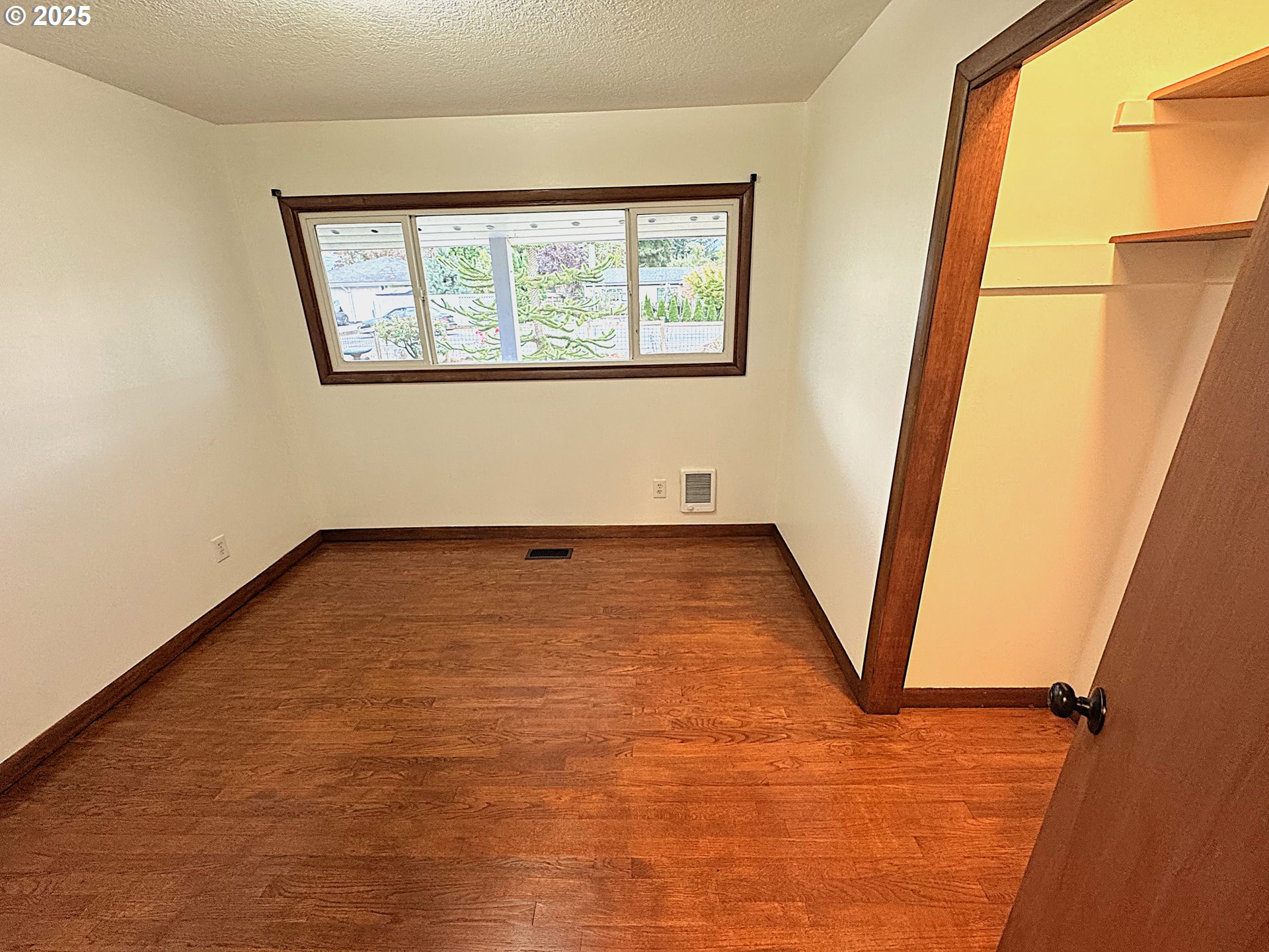 2442 Southeast 190th Avenue Portland, OR 97233 - Photo 24 of 36 an empty room with a window