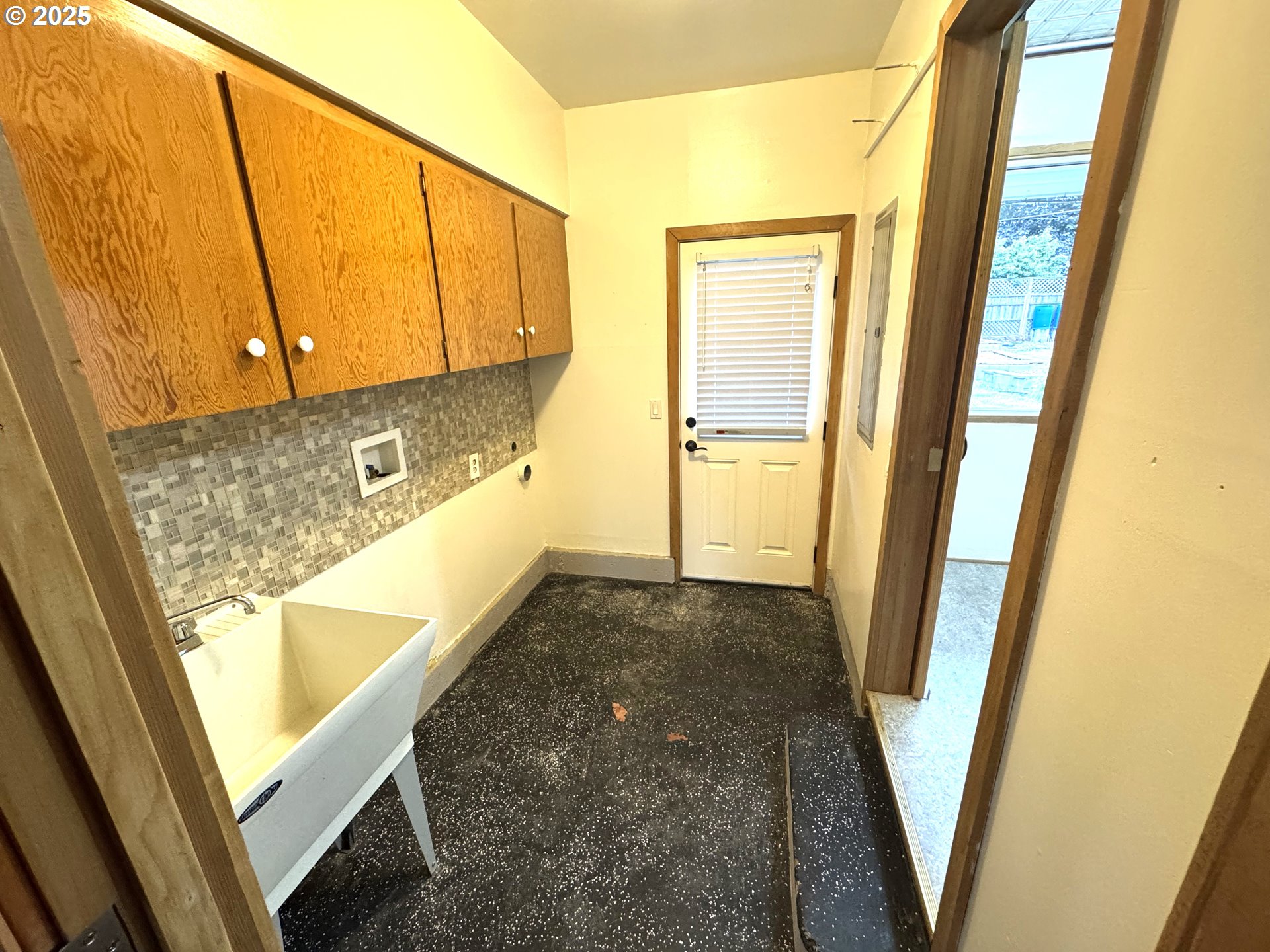 2442 Southeast 190th Avenue Portland, OR 97233 - Photo 30 of 36 a view of a bathroom with tub and door