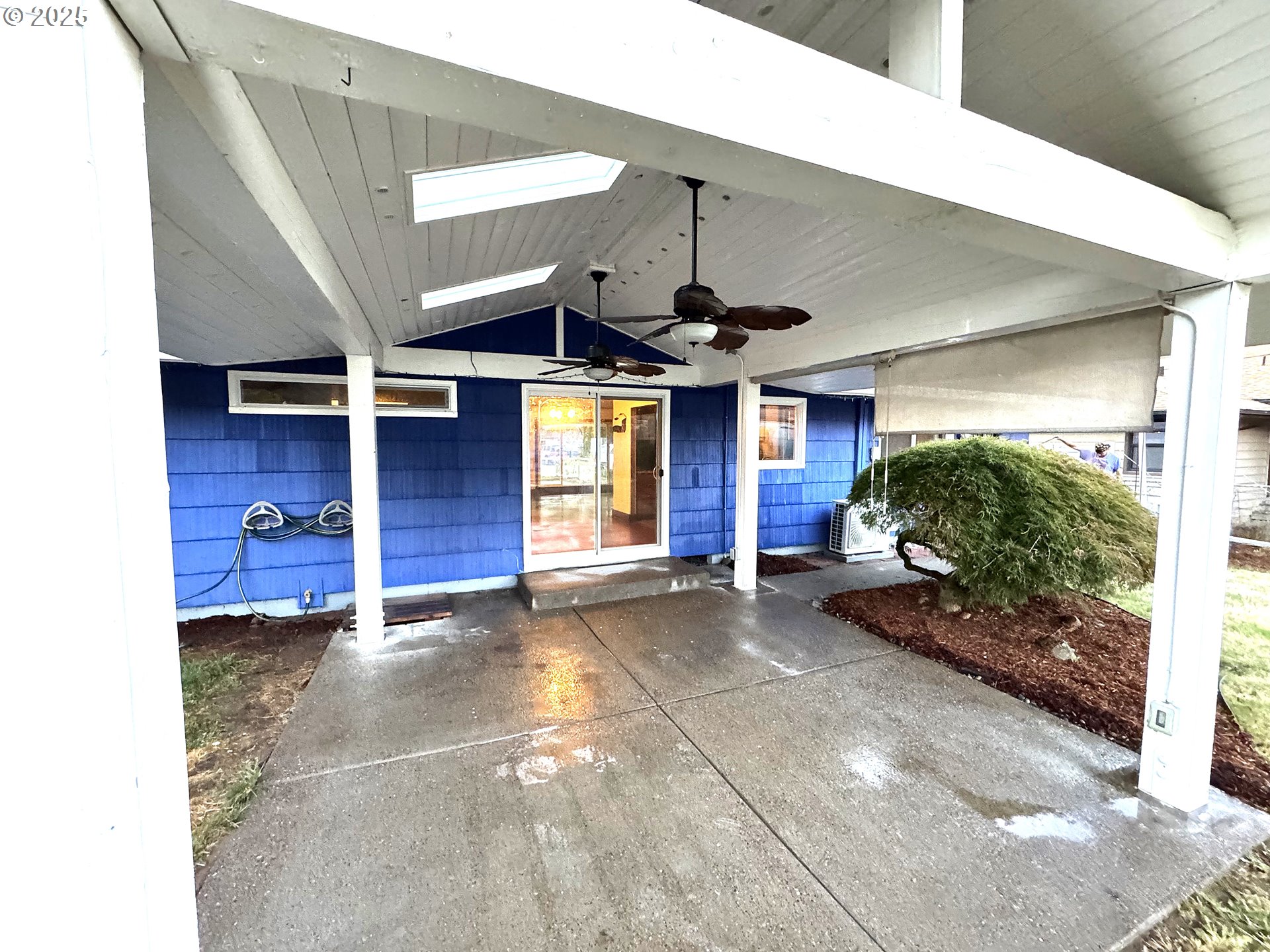 2442 Southeast 190th Avenue Portland, OR 97233 - Photo 33 of 36 a view of a building stairs and a large tree