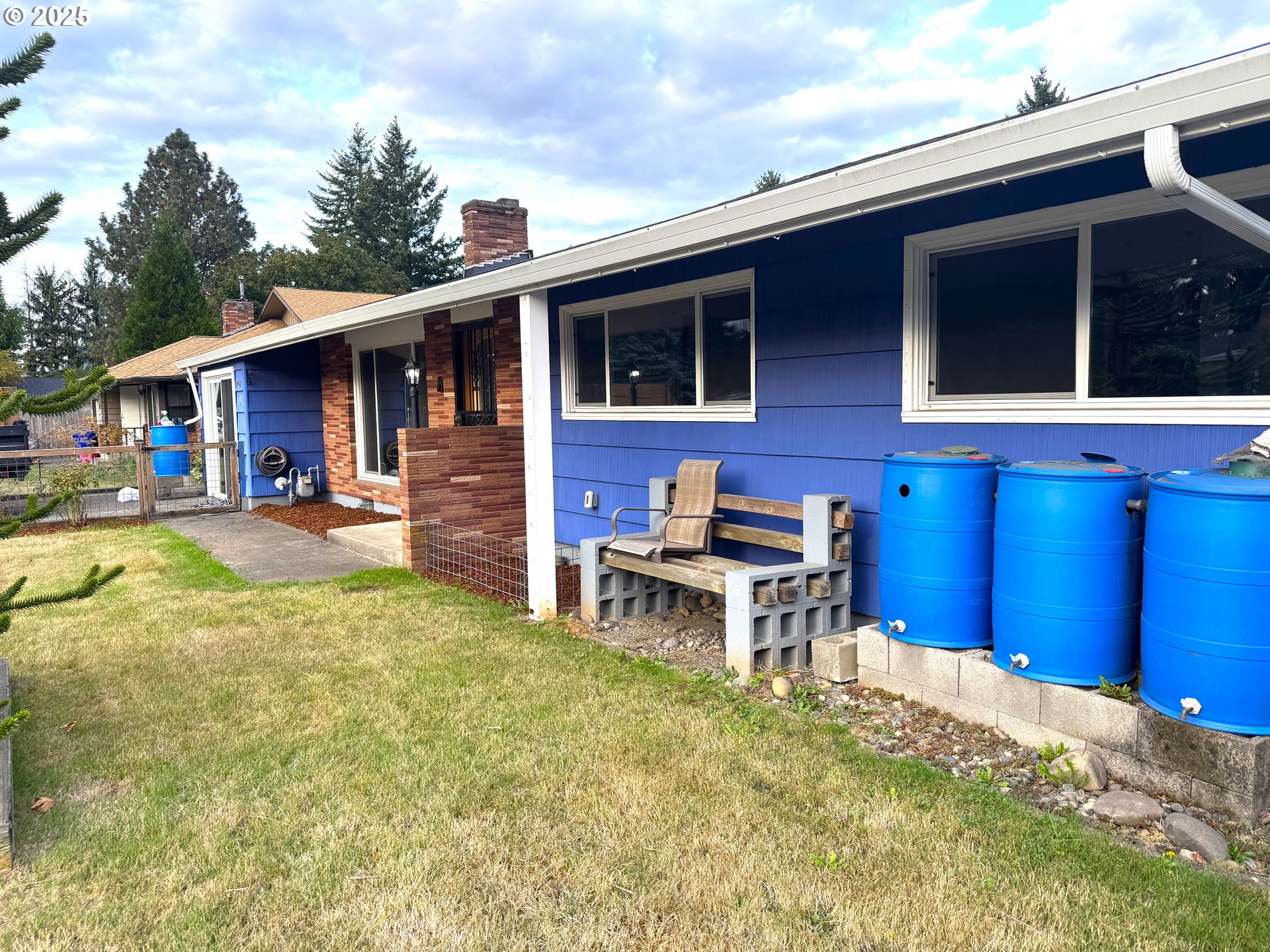 2442 Southeast 190th Avenue Portland, OR 97233 - Photo 4 of 36 a backyard of a house with seating space
