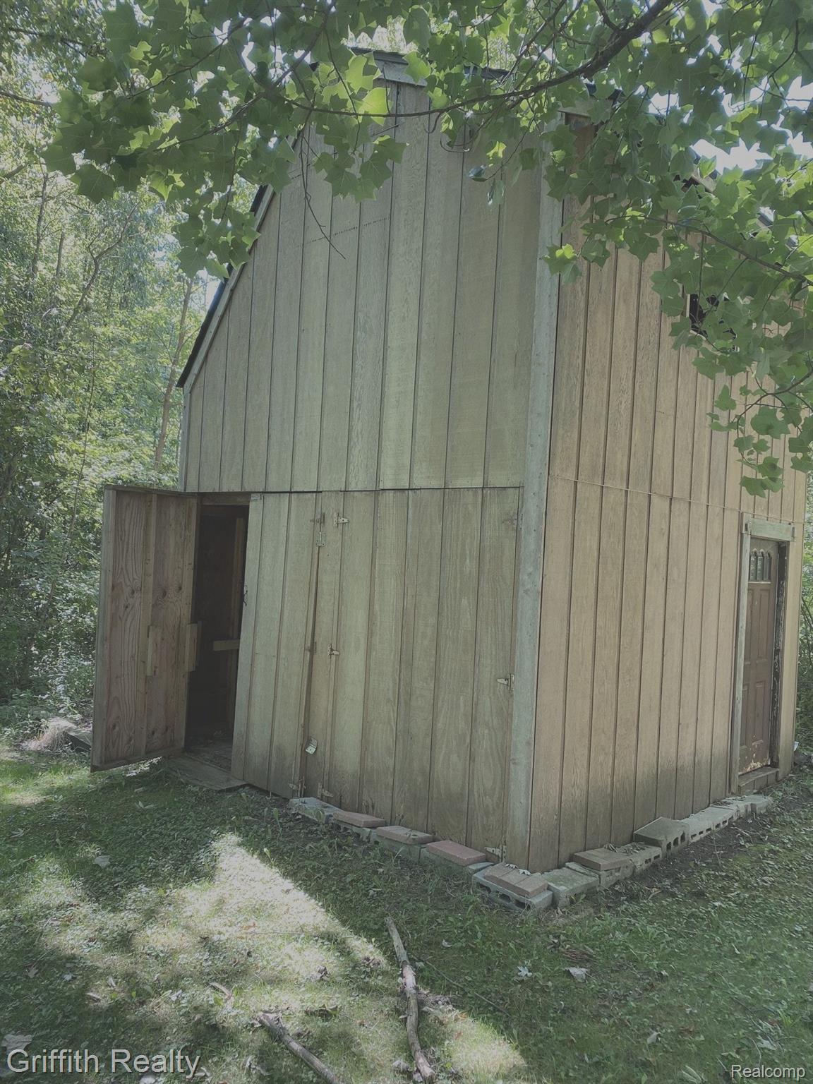 5761 Warner Road Fowlerville, MI 48836 - Photo 40 of 63 double doors on side