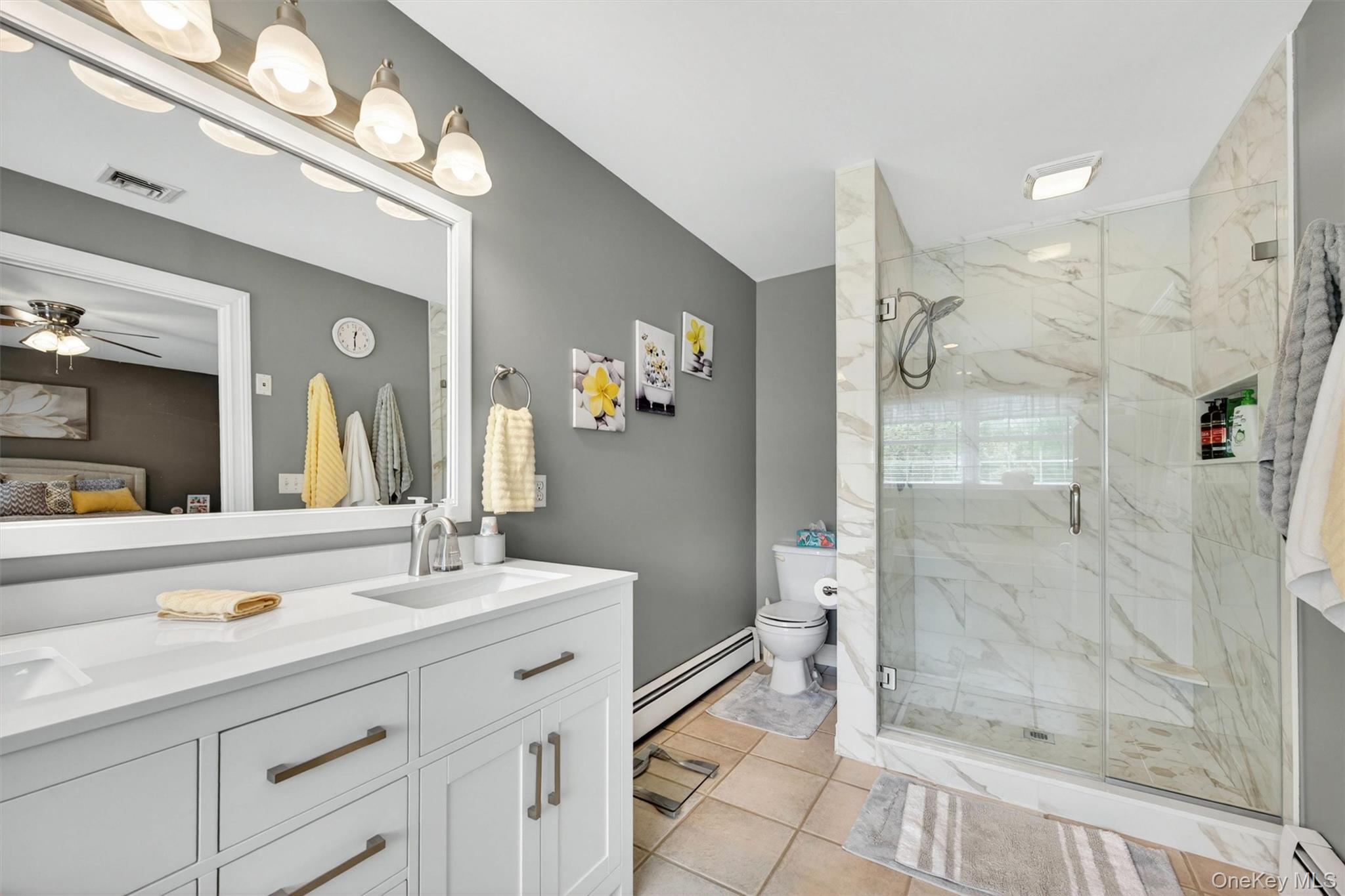 19 Pirog Road Pine Bush, NY 12566 - Photo 23 of 50 a bathroom with a shower sink and mirror
