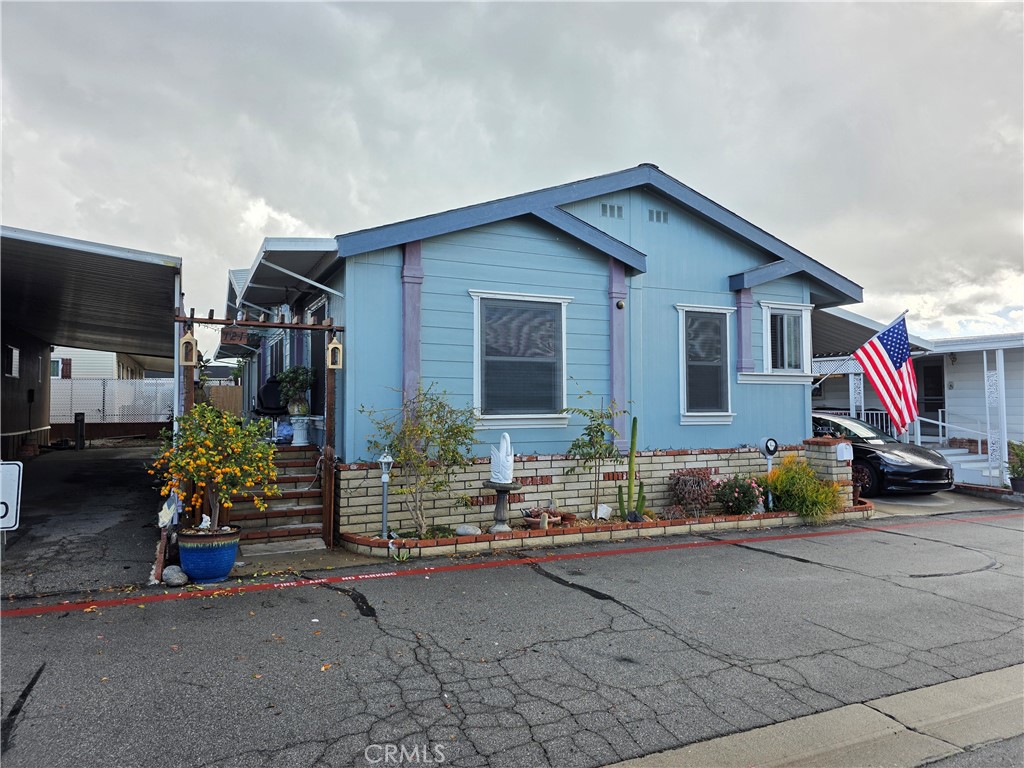 4800 Daleview Avenue, Unit 121 El Monte, CA 91731 - Photo 1 of 10 a front view of a house with outdoor seating
