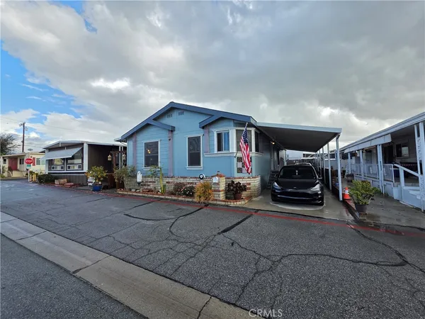 a view of car parked in front of house