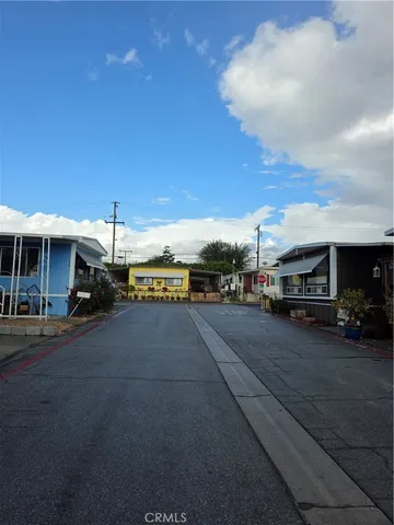 a view of a street in front of the house