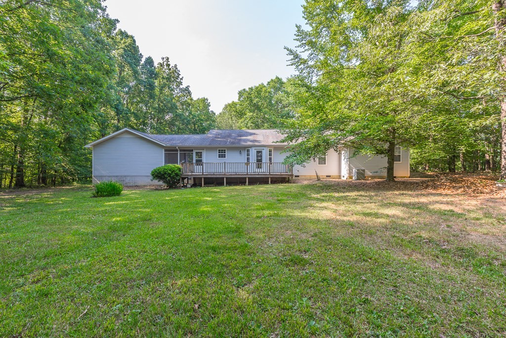311 Johnson Road Chatsworth, GA 30705 - Photo 14 of 46 a house view with a garden space