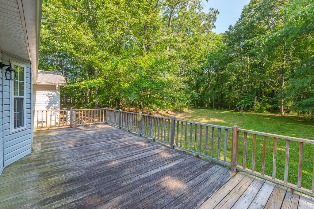 311 Johnson Road Chatsworth, GA 30705 - Photo 16 of 46 a view of deck with wooden floor and fence