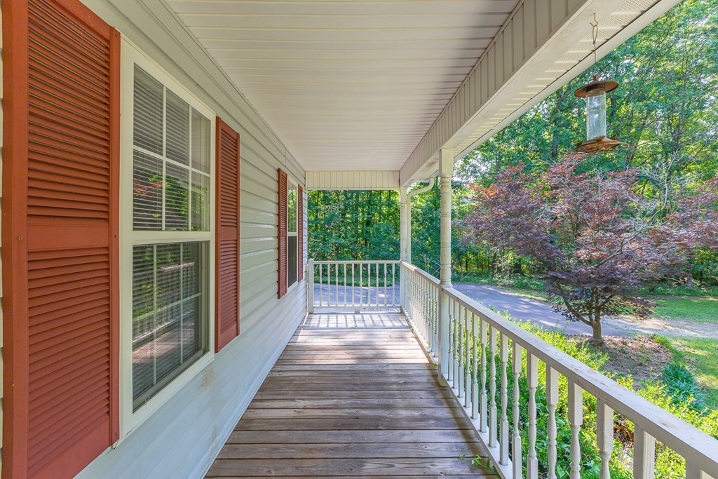 311 Johnson Road Chatsworth, GA 30705 - Photo 17 of 46 a view of a balcony with wooden floor