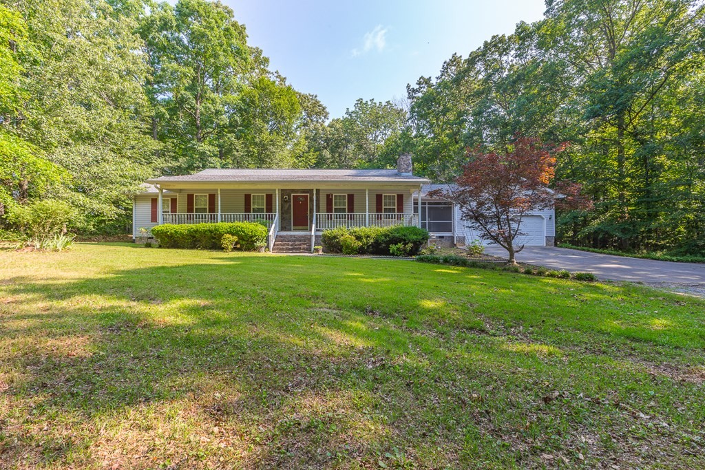 311 Johnson Road Chatsworth, GA 30705 - Photo 4 of 46 a view of house with yard and green space
