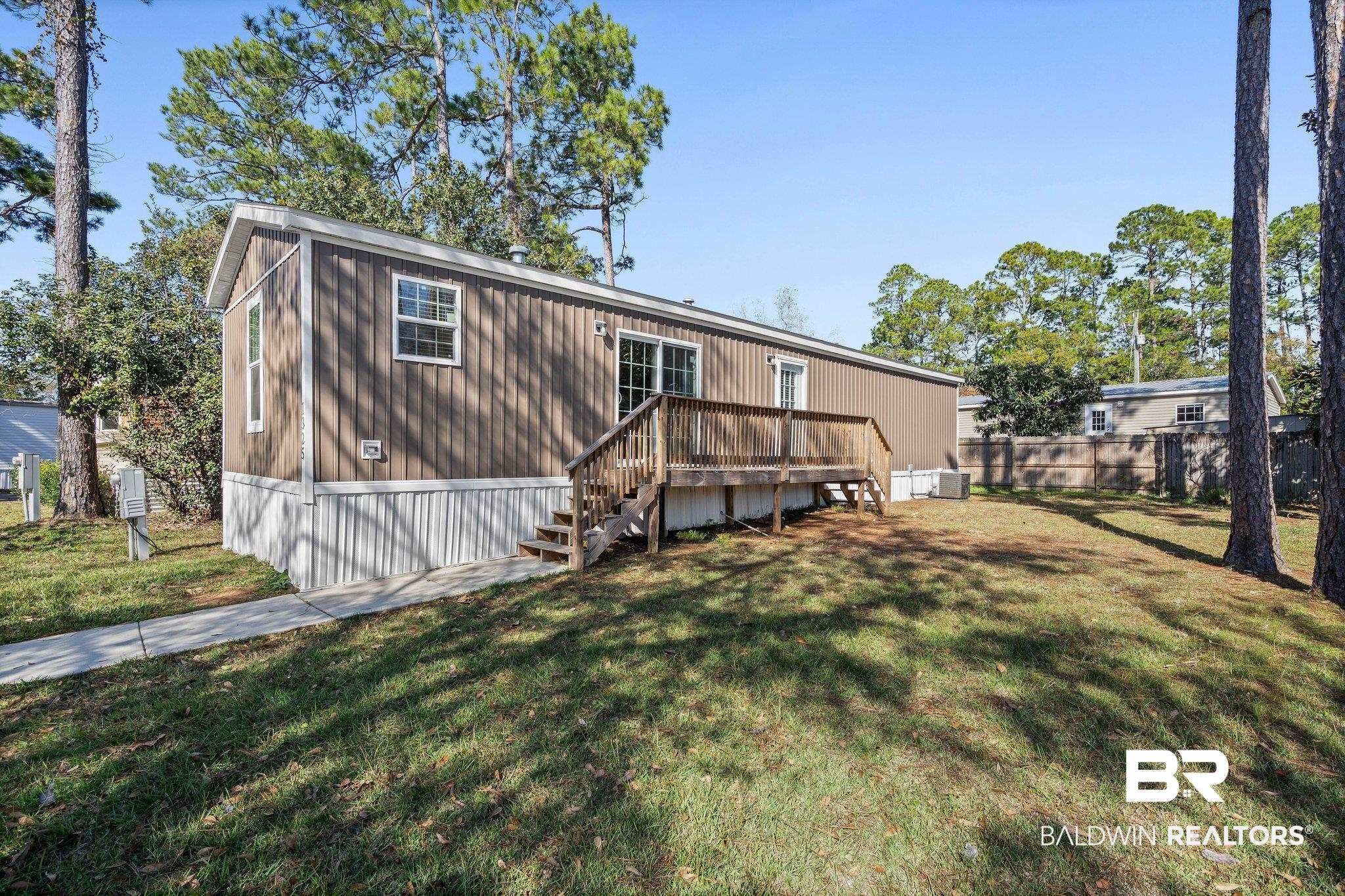 1325 Ridgewood Drive Lillian, AL 36549 - Photo 20 of 32 Back of property featuring stairs and a deck
