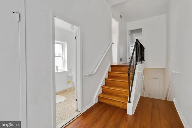 a view of entryway with wooden floor