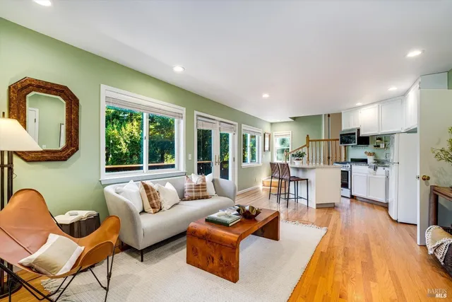 a view of a dining room with furniture window and outside view