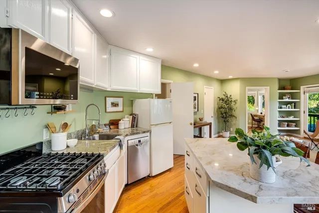 a view of kitchen with breakfast area