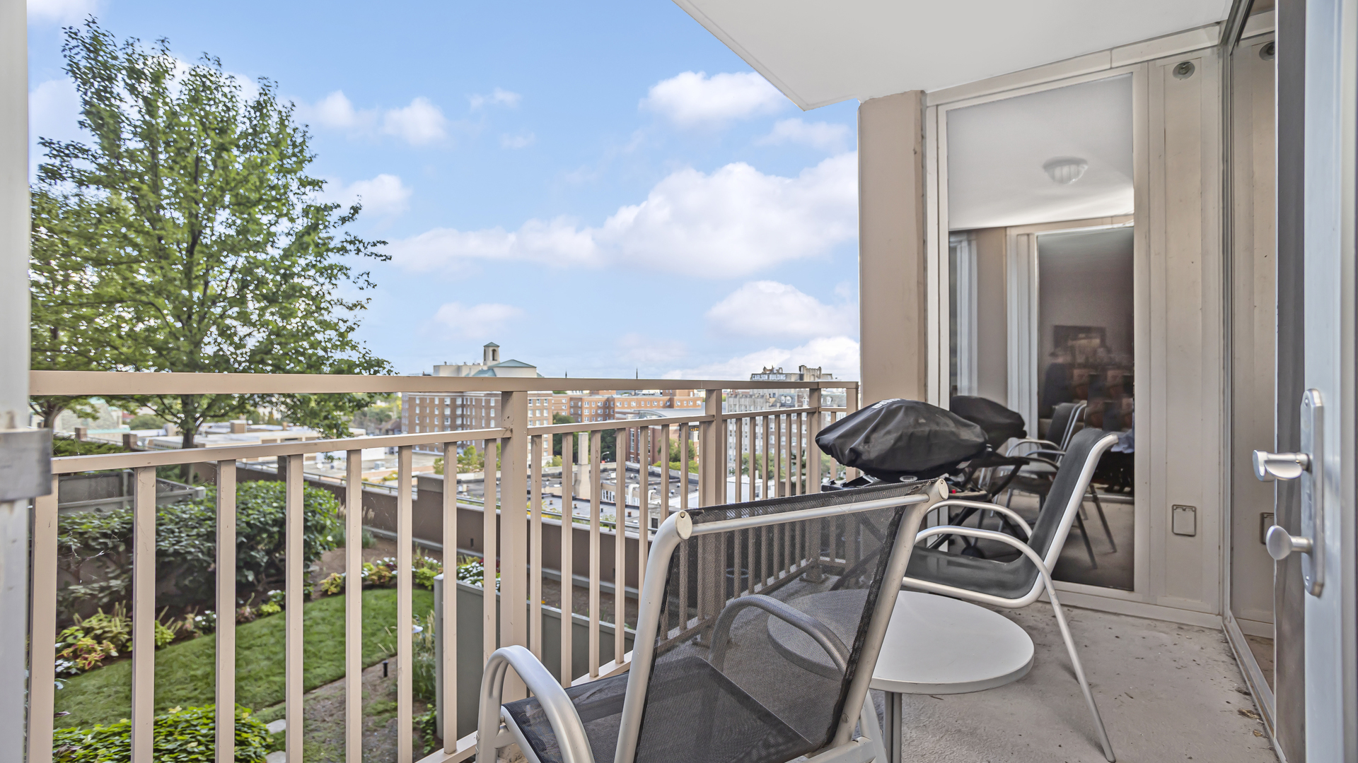 807 Davis Street, Unit 808 Evanston, IL 60201 - Photo 12 of 14 a view of a balcony with chairs