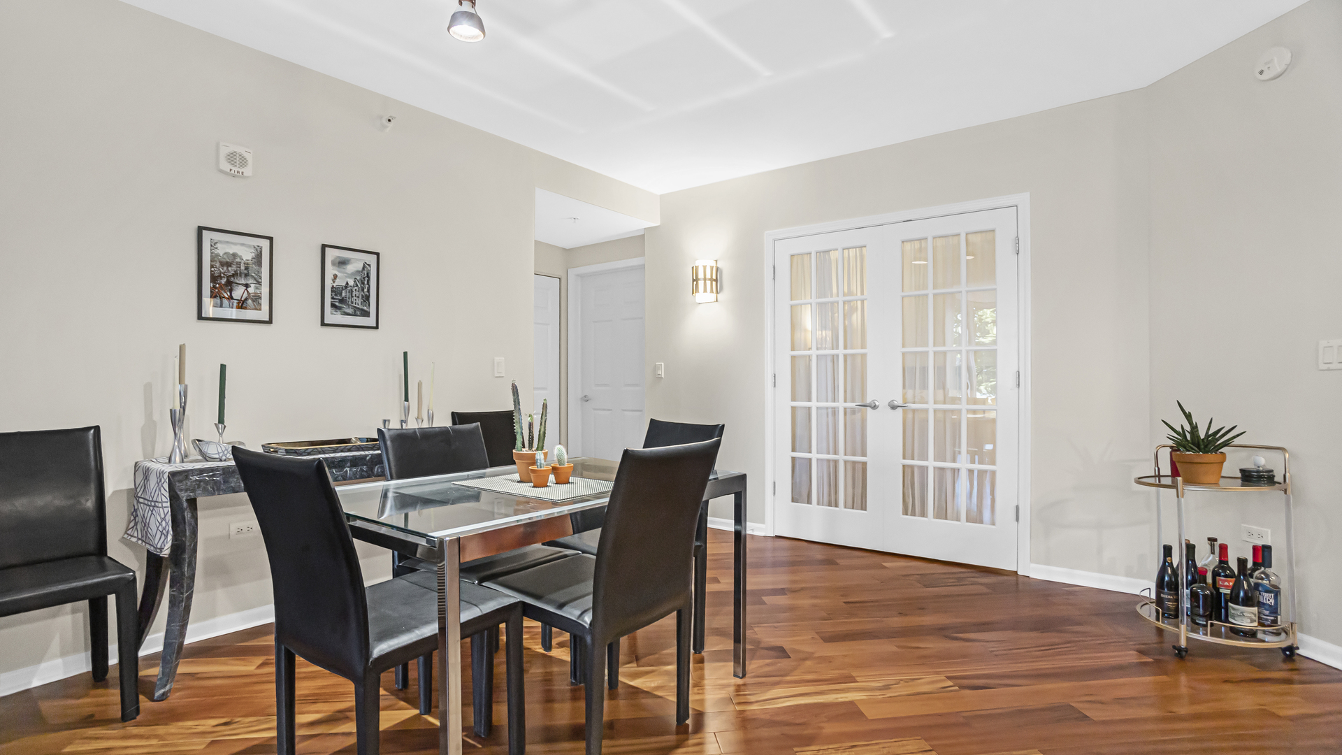807 Davis Street, Unit 808 Evanston, IL 60201 - Photo 5 of 14 a view of a dining room with furniture window and wooden floor