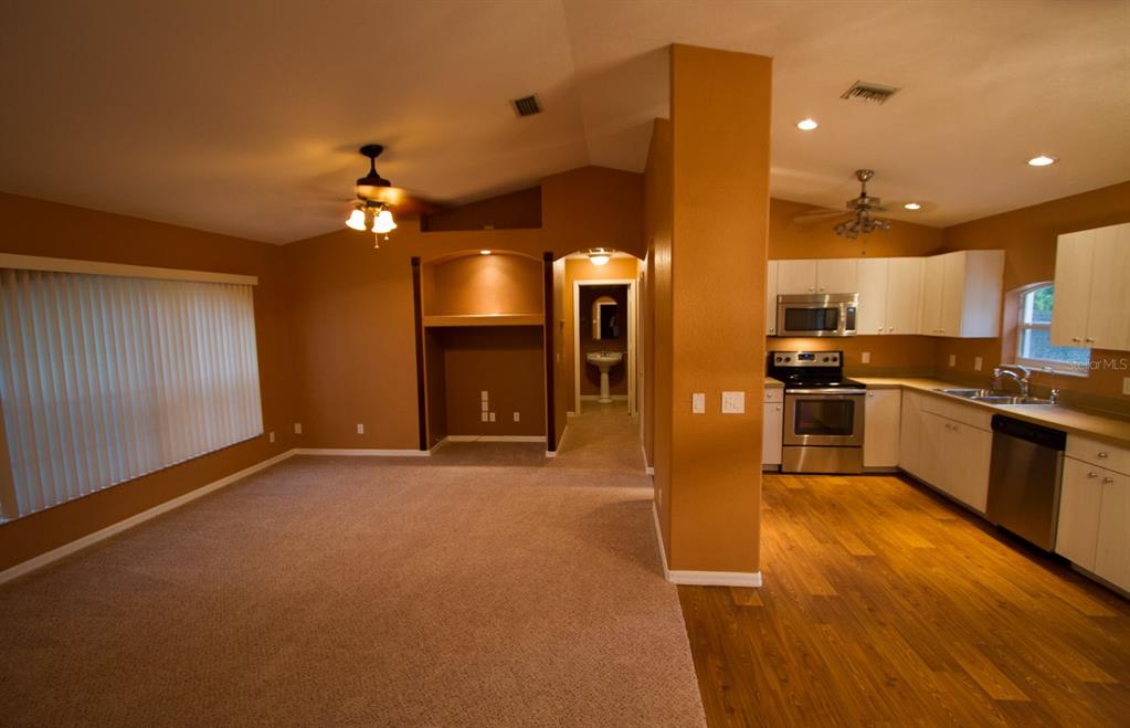 3092 Oklahoma Street North Port, FL 34286 - Photo 3 of 13 view of a kitchen with a sink and refrigerator