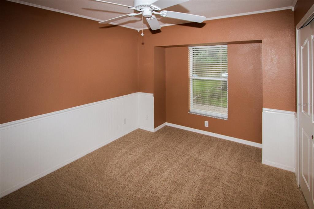 3092 Oklahoma Street North Port, FL 34286 - Photo 9 of 13 a view of an empty room with a window