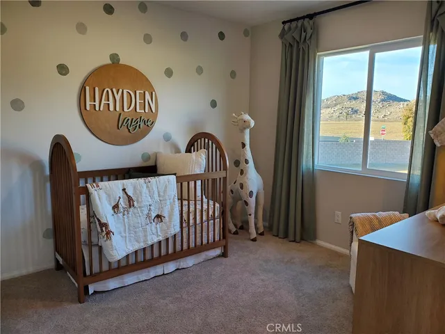 a view of a door and chair in a room