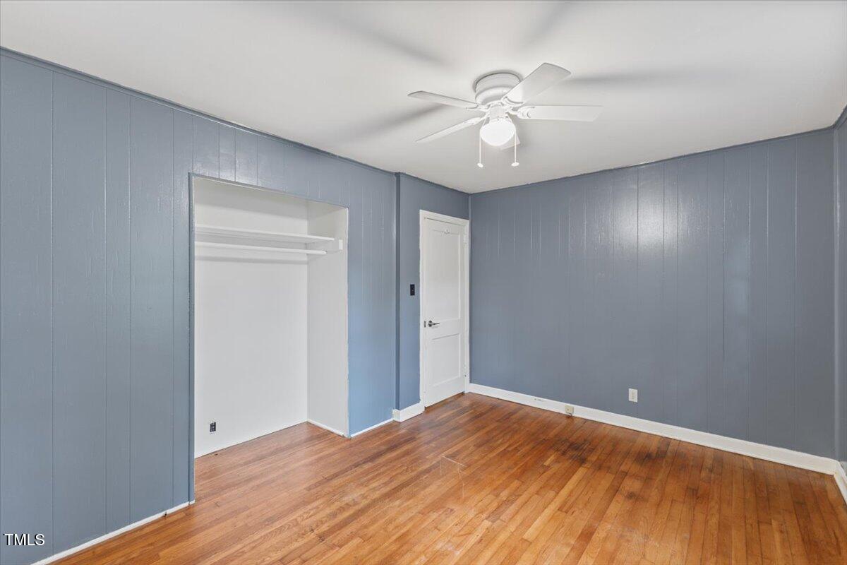 2324 Stevens Road Raleigh, NC 27610 - Photo 13 of 50 a view of empty room with wooden floor