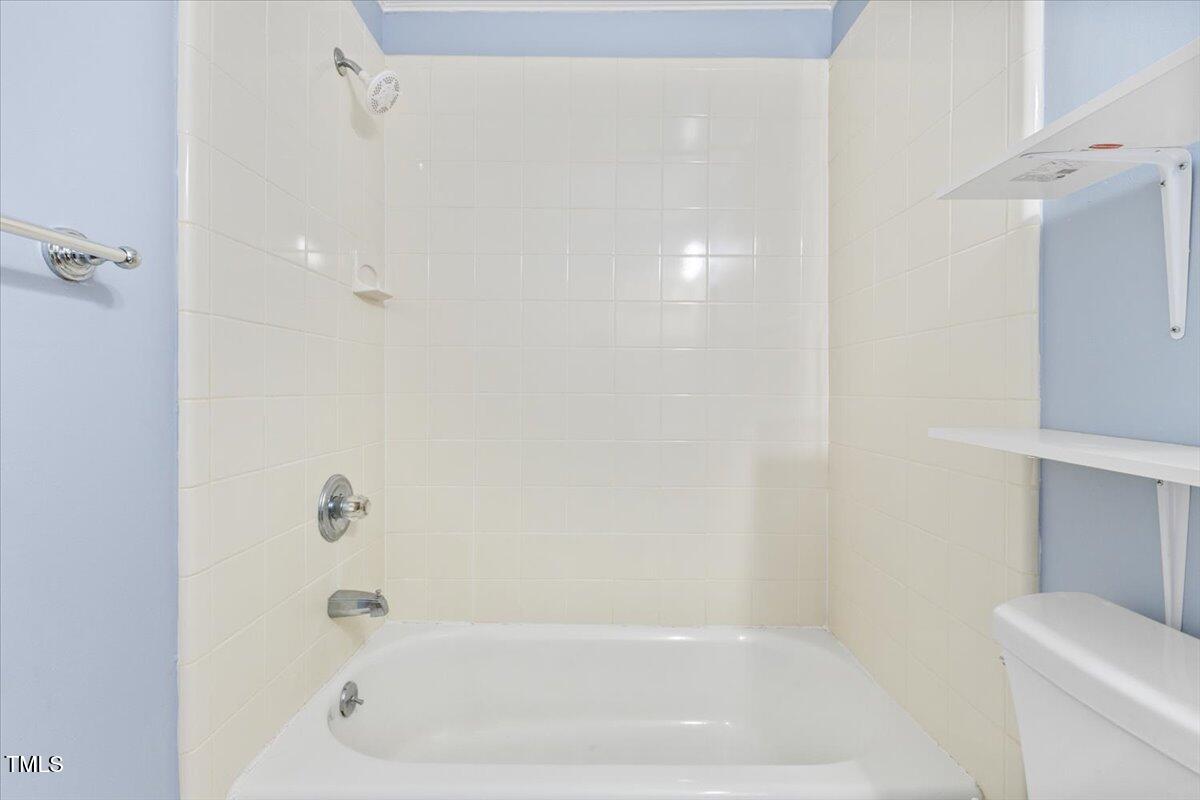 2324 Stevens Road Raleigh, NC 27610 - Photo 19 of 50 a close up of a bathtub curtain
