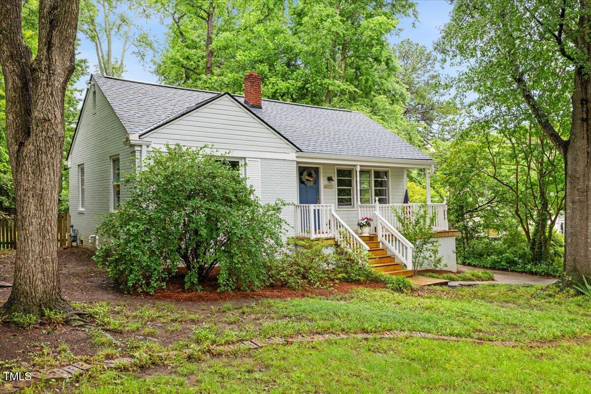 2324 Stevens Road Raleigh, NC 27610 - Photo 3 of 50 a view of a house with a yard and plants