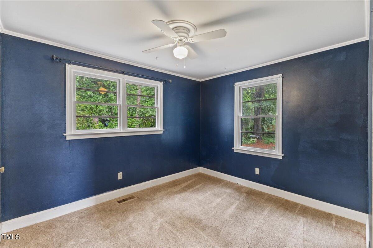 2324 Stevens Road Raleigh, NC 27610 - Photo 32 of 50 a view of an empty room with a window