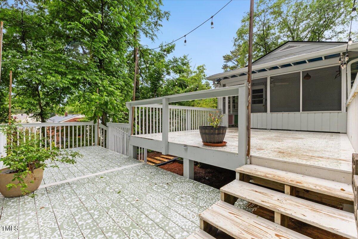 2324 Stevens Road Raleigh, NC 27610 - Photo 40 of 50 a view of backyard with deck and trees