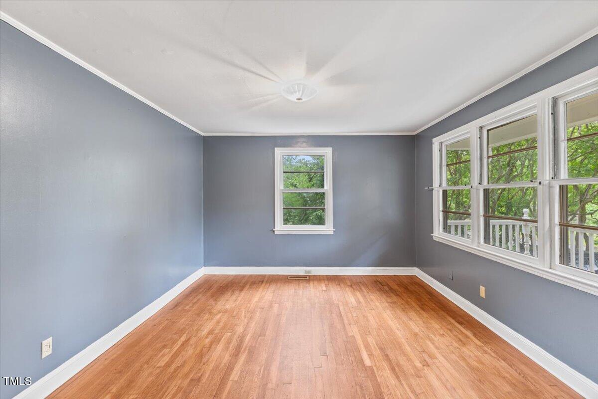 2324 Stevens Road Raleigh, NC 27610 - Photo 10 of 50 a view of a room with wooden floor and windows