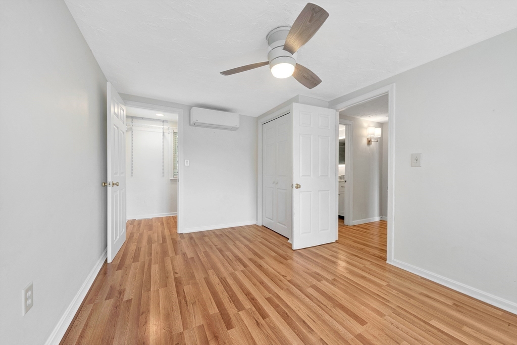 118 Woolford Road Wrentham, MA 02093 - Photo 30 of 41 wooden floor in an empty room with a window