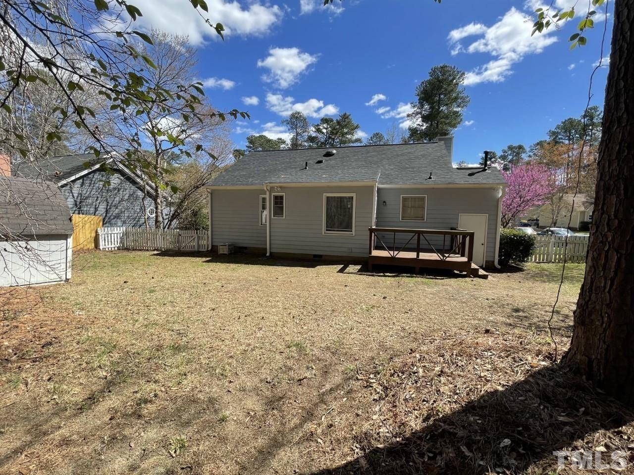 208 Crosspine Drive Raleigh, NC 27603 - Photo 24 of 40 Plenty of space for gardening, firepit, additional landscaping- anything! Seller has put down additional grass seed.
