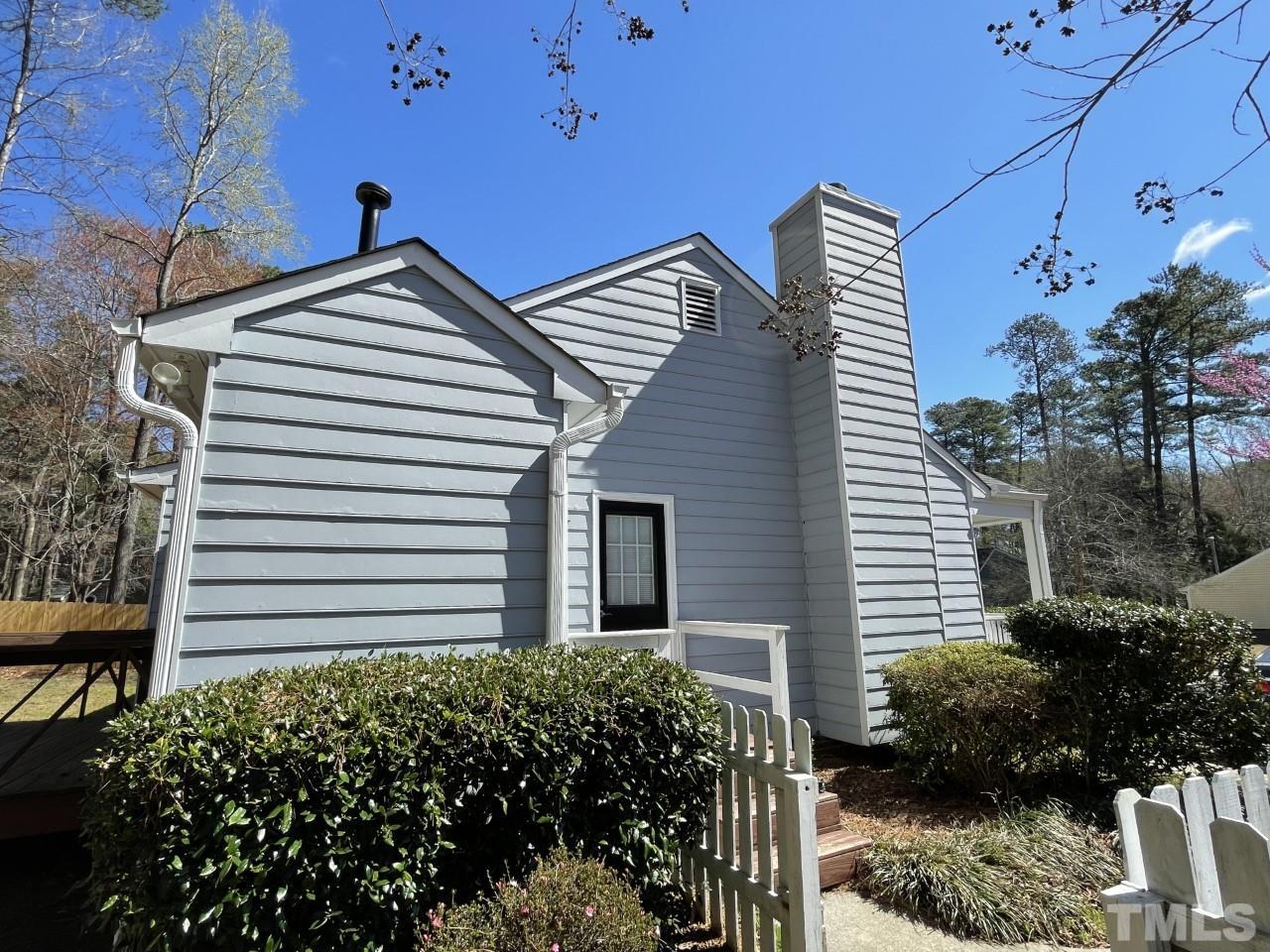 208 Crosspine Drive Raleigh, NC 27603 - Photo 32 of 40 Siding is Masonite. Painted in 2019.