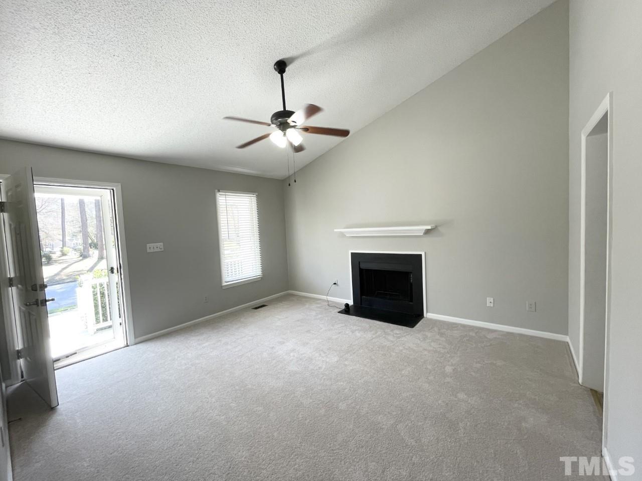 208 Crosspine Drive Raleigh, NC 27603 - Photo 4 of 40 Cozy up to the fire on the cooler fall and winter nights!