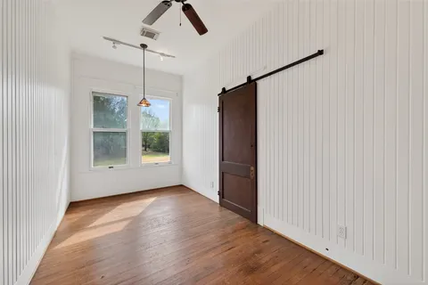 a view of house with outdoor space and sitting area