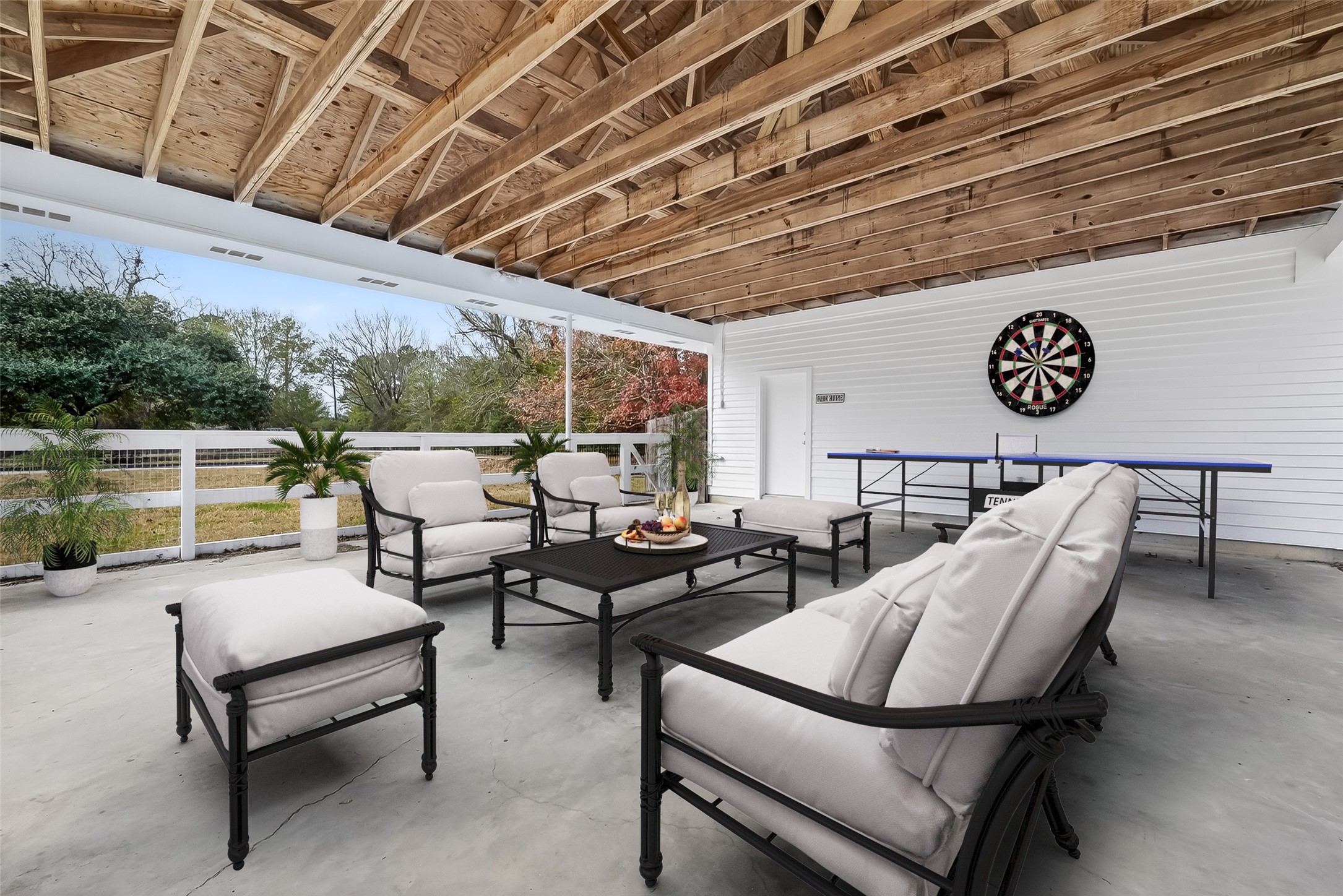 38011 Spur 149 Road Magnolia, TX 77354 - Photo 29 of 40 This expansive carport area offers endless possibilities for customization, perfect for creating your dream outdoor living space.