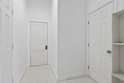 a room with lots of furniture and toys