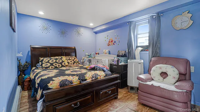 a bed room with a bed and a window