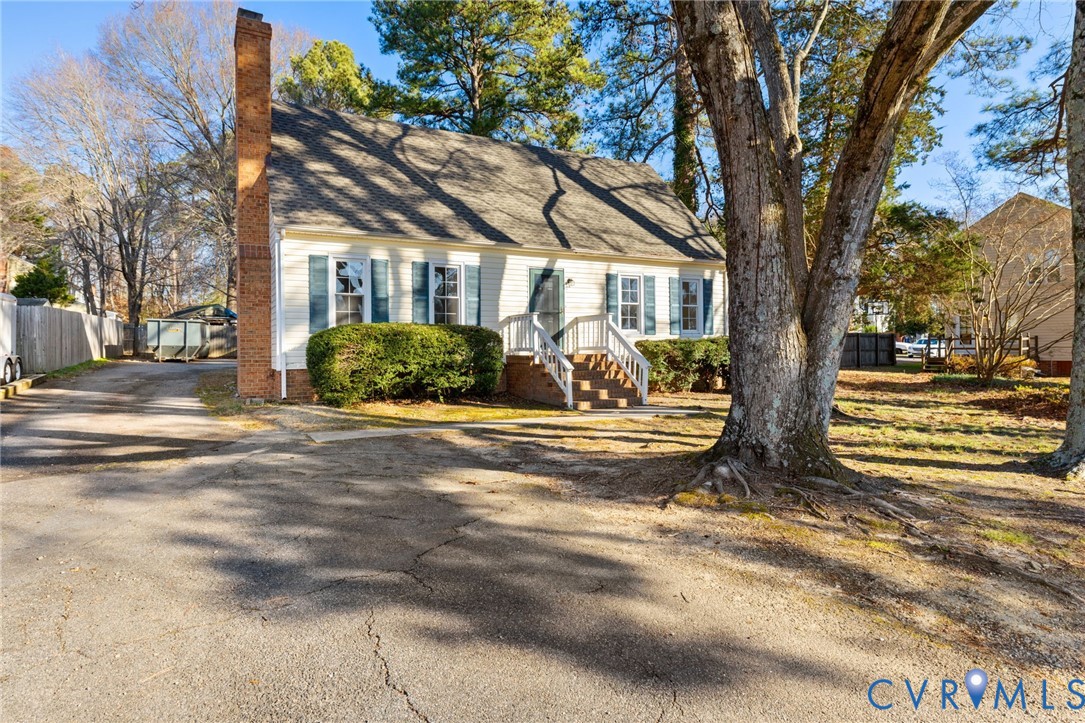 9924 Reams Road Chesterfield, VA 23236 - Photo 1 of 30 a front view of a house with a yard